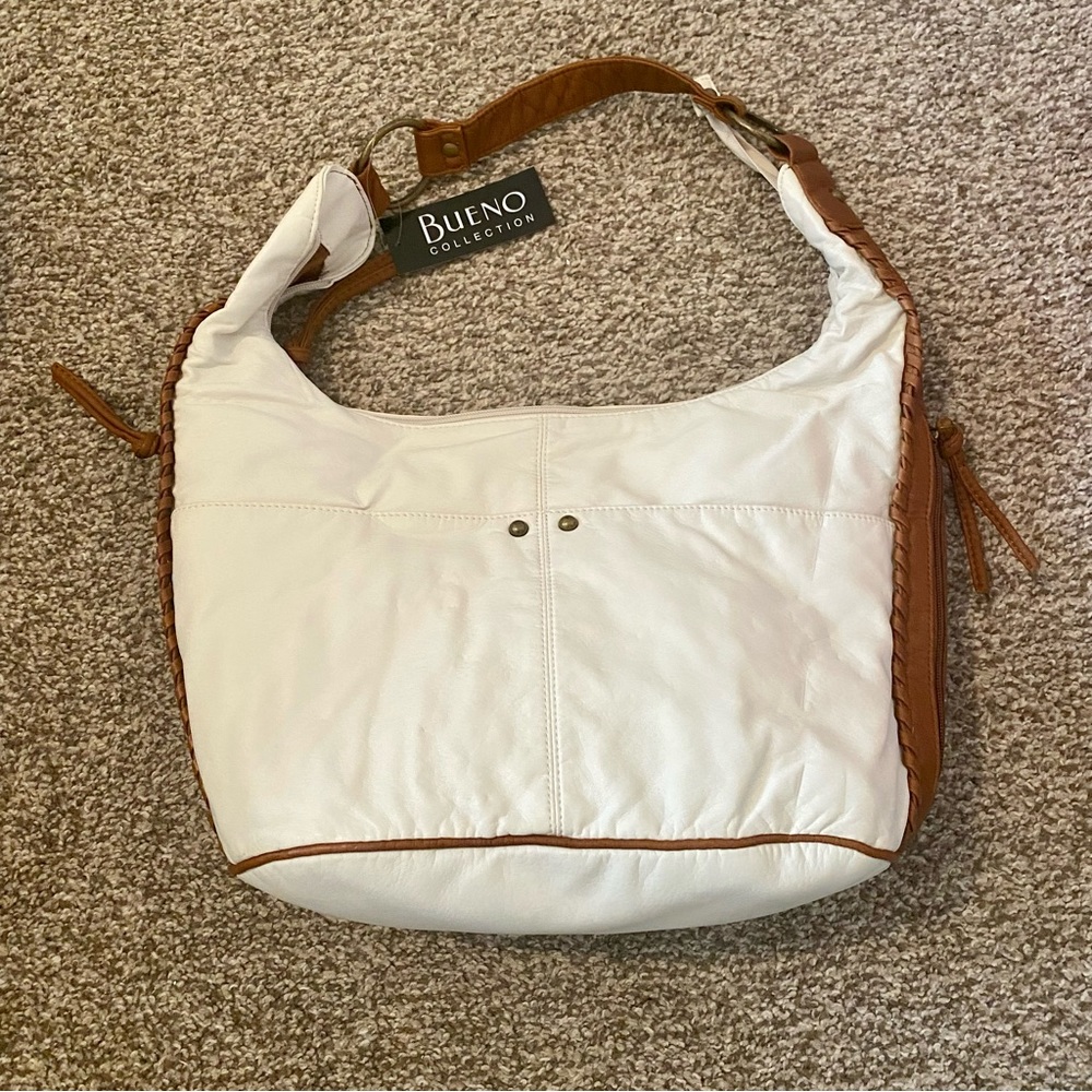 Bueno purse. NWT. Was in my closet for a while didn’t use it so it needs to go.